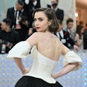 US-British actress Lily Collins arrives for the 2023 Met Gala at the Metropolitan Museum of Art on May 1, 2023, in New York. - The Gala raises money for the Metropolitan Museum of Art's Costume Institute. The Gala's 2023 theme is "Karl Lagerfeld: A Line of Beauty." (Photo by Angela WEISS / AFP)